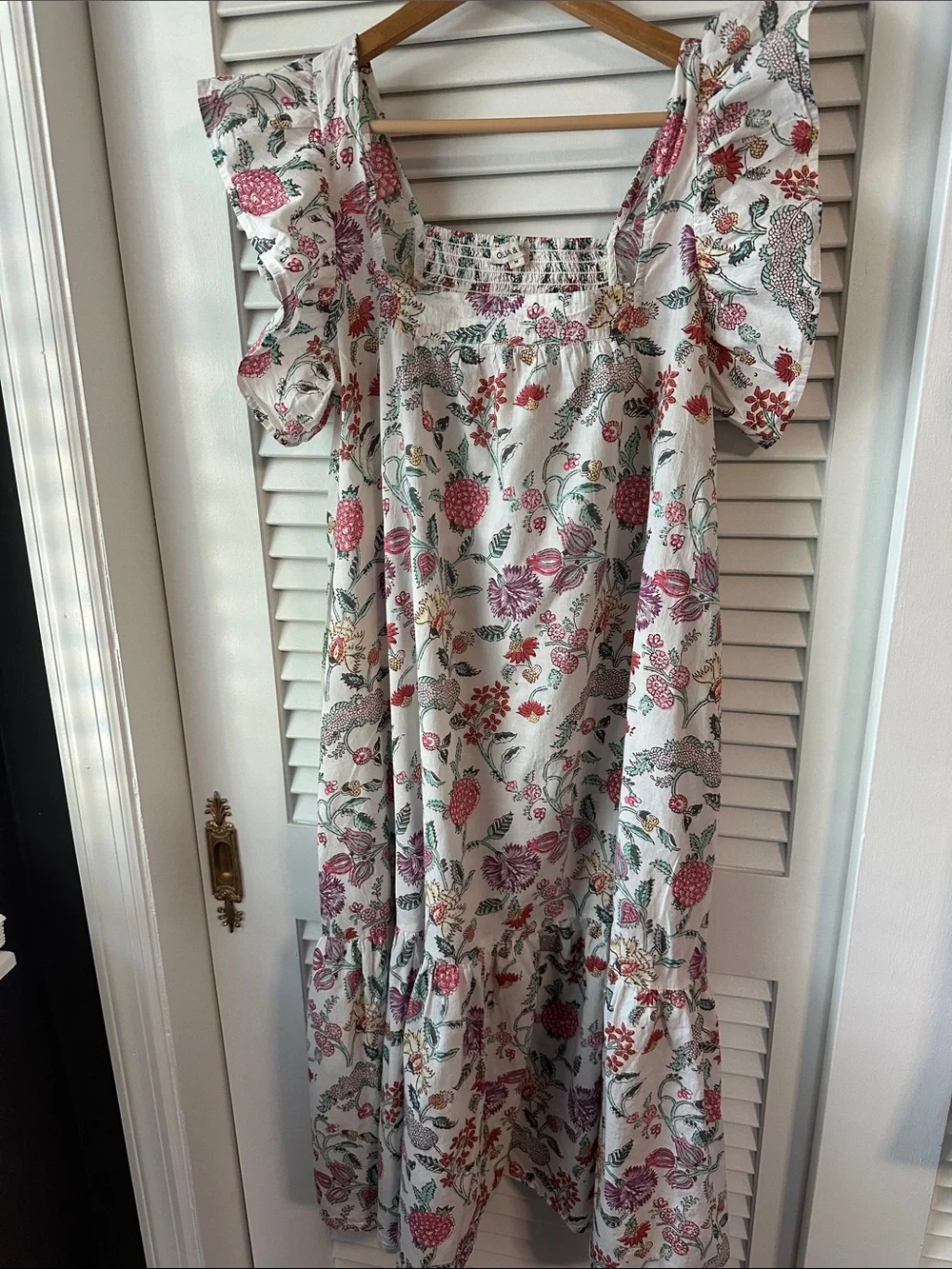 Beautiful Floral White Cotton Maxi Dress with Ruffle Sleeves and hem.